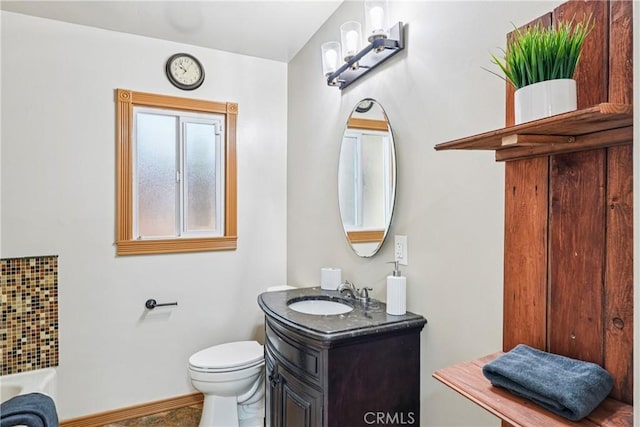 509 N Hillford Ave, Compton, CA 90220 - bathroom with vanity, toilet, baseboards, and a tub