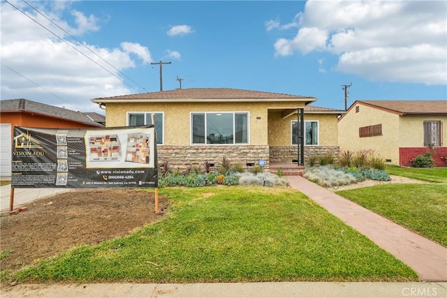 509 N Hillford Ave, Compton, CA 90220 - bungalow featuring stone siding, stucco siding, and a front yard