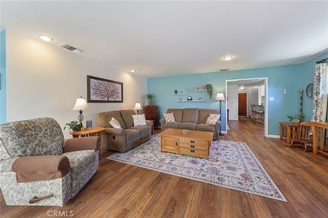 15403 Domart Ave, Norwalk, CA 90650 - living room with wood finished floors, recessed lighting, and baseboards