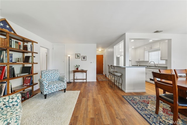 15403 Domart Ave, Norwalk, CA 90650 - living area with wood finished floors
