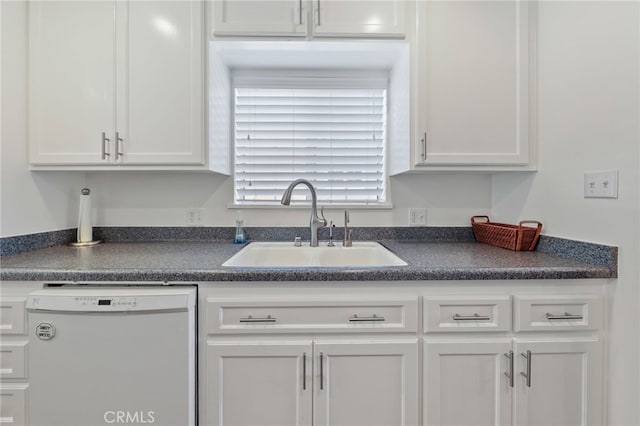 15403 Domart Ave, Norwalk, CA 90650 - kitchen featuring white dishwasher, dark countertops, a sink, and white cabinets
