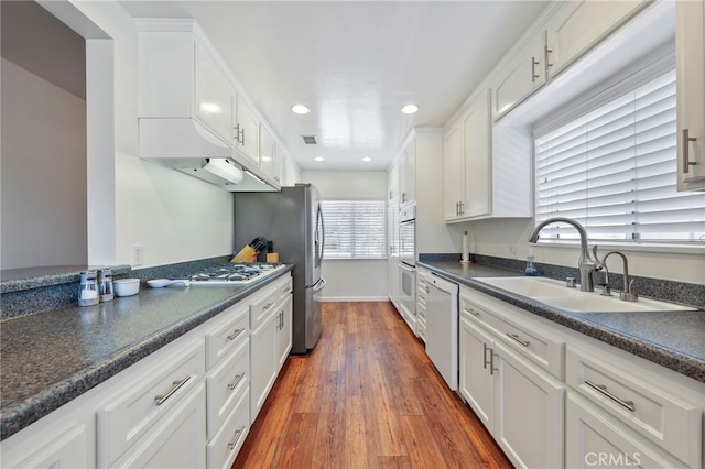 15403 Domart Ave, Norwalk, CA 90650 - kitchen featuring a sink, white cabinetry, white appliances, and recessed lighting