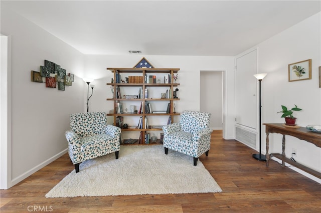 15403 Domart Ave, Norwalk, CA 90650 - sitting room featuring wood finished floors and baseboards