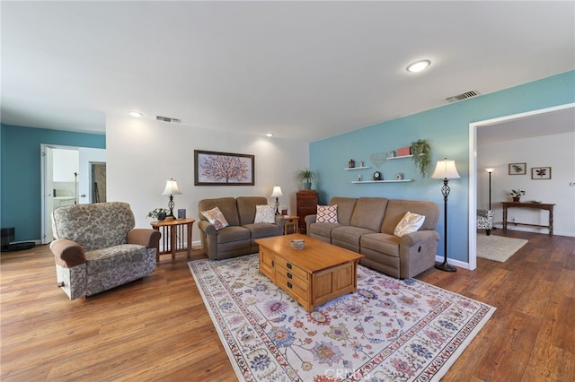 15403 Domart Ave, Norwalk, CA 90650 - living area featuring hardwood / wood-style flooring and recessed lighting