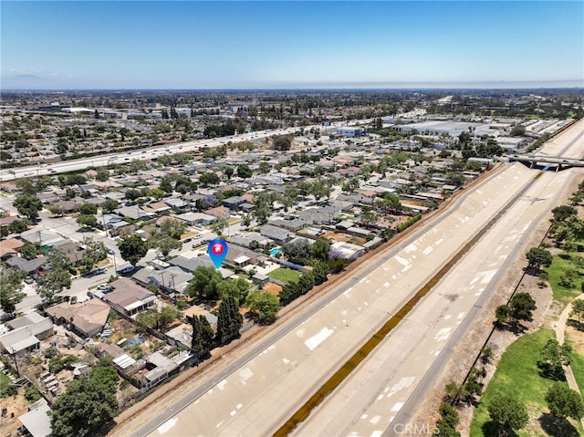 15403 Domart Ave, Norwalk, CA 90650 - aerial perspective of suburban area with a highway