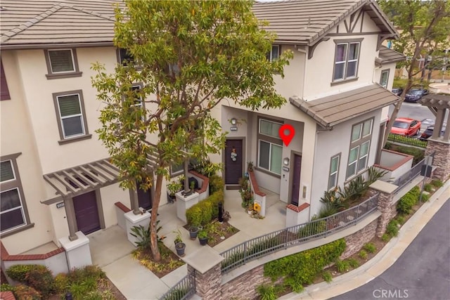 15315 Ashley Ct, Whittier, CA 90603 - view of property featuring stucco siding and a tiled roof