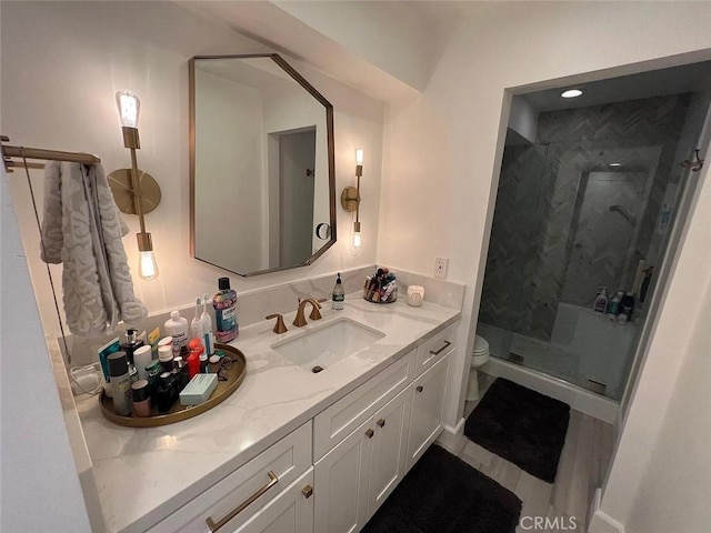 12938 Valleyheart Dr Unit 2, Studio City, CA 91604 - bathroom featuring vanity, toilet, and a shower stall