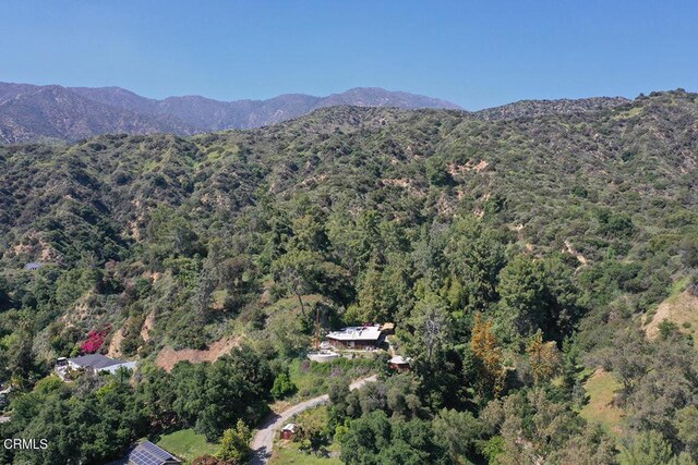 633 Norumbega Dr, Monrovia, CA 91016 - aerial view of property and surrounding area featuring a forest and a mountainous background