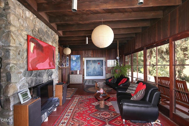 633 Norumbega Dr, Monrovia, CA 91016 - living area featuring a wood ceiling with exposed beams, wooden walls, and a stone fireplace