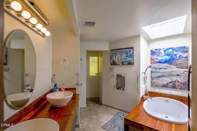 633 Norumbega Dr, Monrovia, CA 91016 - bathroom with a skylight, a jetted tub, and double vanity