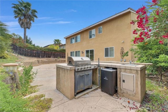 46186 Via Ln, Tranquila, Temecula, CA 92592 - view of patio / terrace featuring a sink