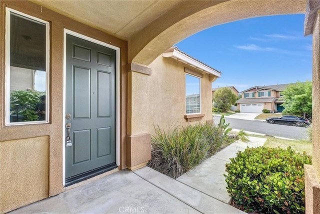 46186 Via Ln, Tranquila, Temecula, CA 92592 - property entrance featuring stucco siding