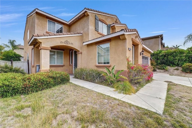 46186 Via Ln, Tranquila, Temecula, CA 92592 - view of property with stucco siding, an attached garage, concrete driveway, and a tile roof