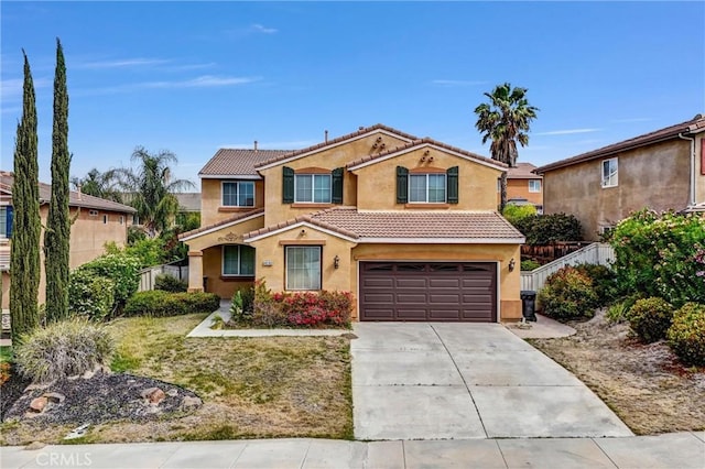 46186 Via Ln, Tranquila, Temecula, CA 92592 - view of front facade featuring a tiled roof, a garage, stucco siding, and driveway