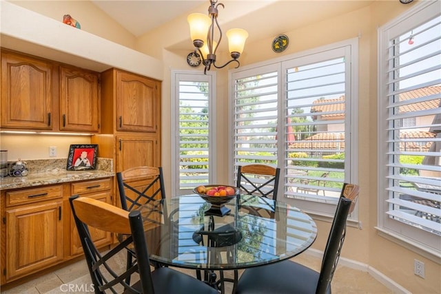 31436 Corte Sonora, Temecula, CA 92592 - dining room featuring a chandelier, plenty of natural light, vaulted ceiling, and light tile patterned flooring