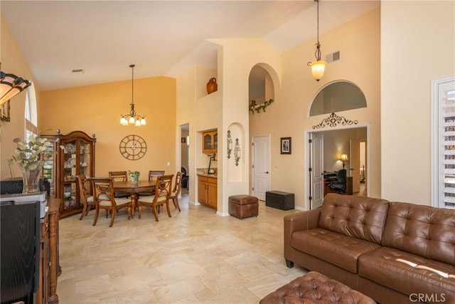 31436 Corte Sonora, Temecula, CA 92592 - living area featuring high vaulted ceiling and a chandelier
