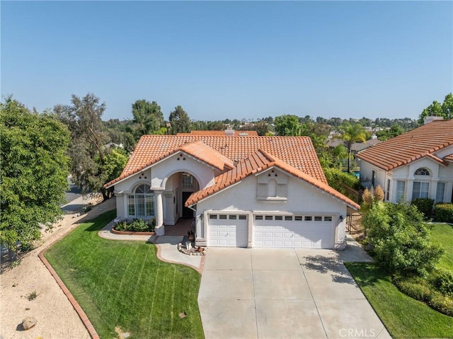31436 Corte Sonora, Temecula, CA 92592 - mediterranean / spanish-style home featuring a tiled roof, an attached garage, stucco siding, a front lawn, and driveway