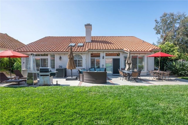 31436 Corte Sonora, Temecula, CA 92592 - rear view of property featuring a tile roof, a chimney, an outdoor living space, a lawn, and stucco siding
