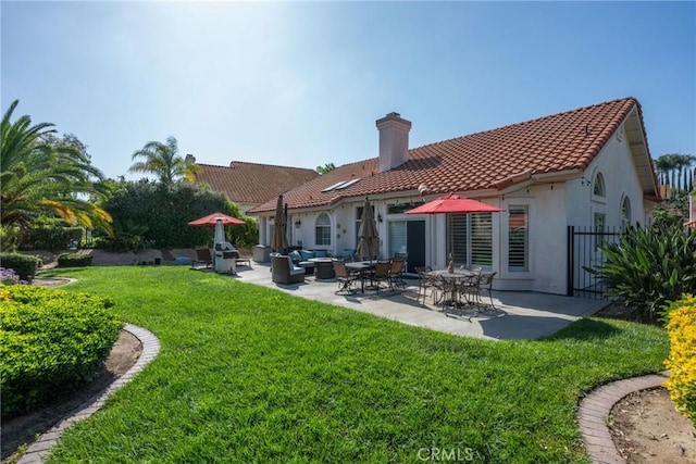 31436 Corte Sonora, Temecula, CA 92592 - rear view of property with a chimney, a patio area, stucco siding, and a tile roof
