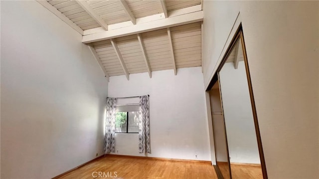 445 W Duarte Rd Unit 5, Arcadia, CA 91007 - empty room with light wood finished floors, beamed ceiling, and high vaulted ceiling