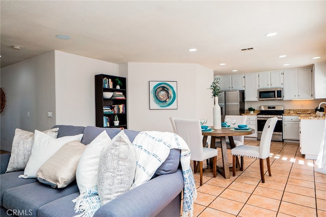382 Settlers Rd, Upland, CA 91786 - living area featuring light tile patterned flooring and recessed lighting