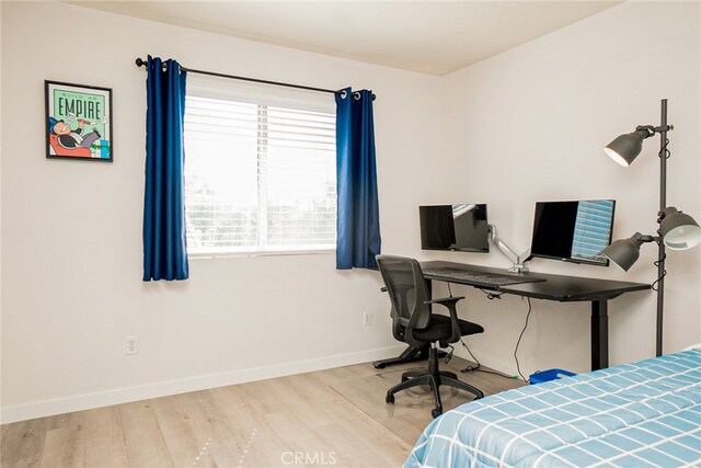 382 Settlers Rd, Upland, CA 91786 - bedroom featuring wood finished floors, baseboards, and a desk