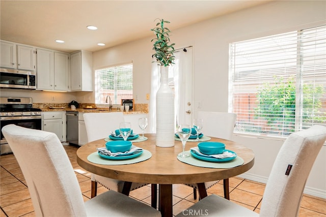 382 Settlers Rd, Upland, CA 91786 - dining room featuring light tile patterned flooring, recessed lighting, and baseboards