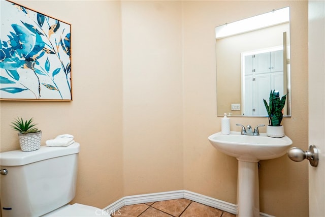 382 Settlers Rd, Upland, CA 91786 - half bathroom featuring toilet, baseboards, and tile patterned floors