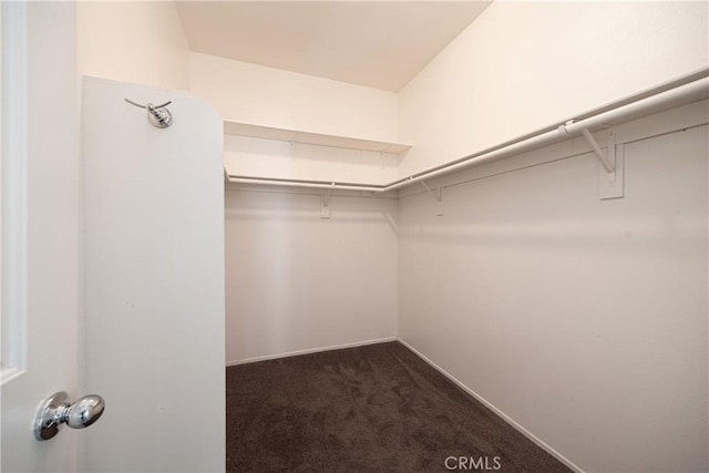31460 Tulette Ln, Winchester, CA 92596 - spacious closet featuring dark colored carpet