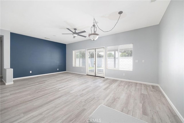 31460 Tulette Ln, Winchester, CA 92596 - empty room with a ceiling fan, light wood-style floors, and baseboards