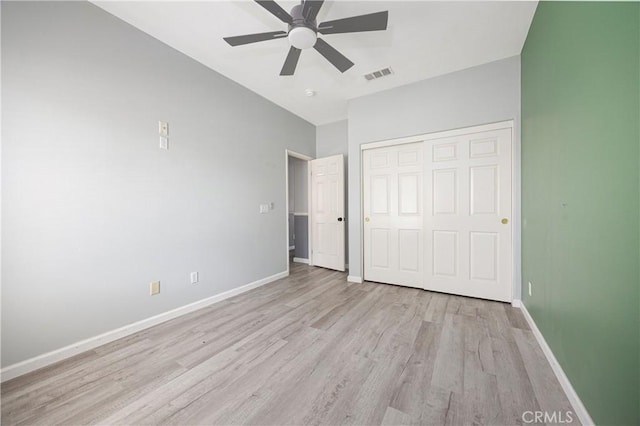 31460 Tulette Ln, Winchester, CA 92596 - unfurnished bedroom featuring light wood-type flooring, baseboards, a closet, lofted ceiling, and ceiling fan
