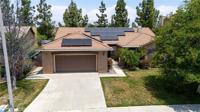 31460 Tulette Ln, Winchester, CA 92596 - view of front of house featuring a tiled roof, stucco siding, a front lawn, concrete driveway, and an attached garage