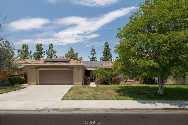 31460 Tulette Ln, Winchester, CA 92596 - view of front of property featuring a tiled roof, a garage, a front lawn, stucco siding, and driveway