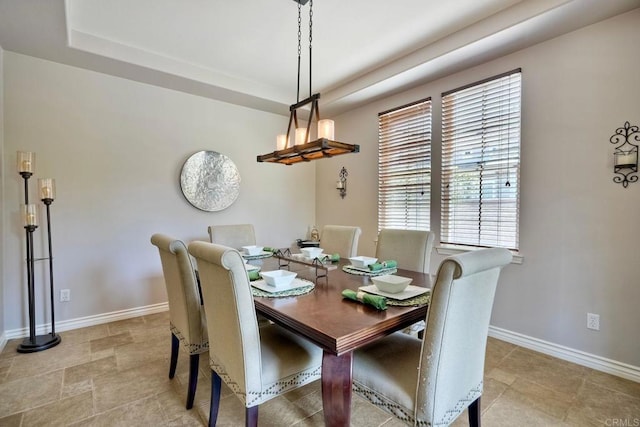 3522 Camino Cereza, Carlsbad, CA 92009 - dining area featuring a raised ceiling and baseboards