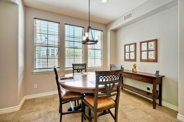 3522 Camino Cereza, Carlsbad, CA 92009 - dining space with a chandelier and baseboards