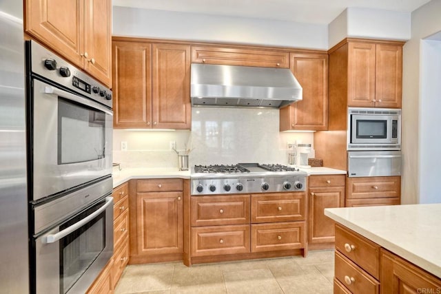 3522 Camino Cereza, Carlsbad, CA 92009 - kitchen with extractor fan, stainless steel appliances, a warming drawer, and light countertops