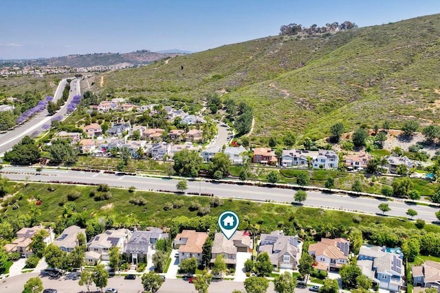 3522 Camino Cereza, Carlsbad, CA 92009 - aerial perspective of suburban area featuring a mountainous background