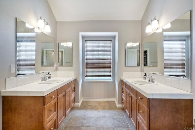 3522 Camino Cereza, Carlsbad, CA 92009 - bathroom with baseboards and two vanities