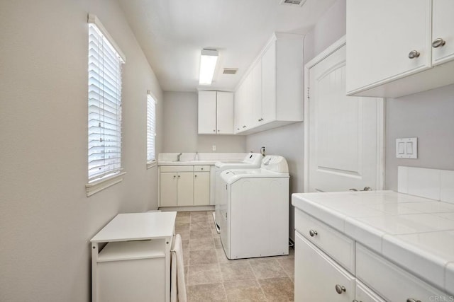 3522 Camino Cereza, Carlsbad, CA 92009 - laundry area featuring cabinet space and washer and dryer