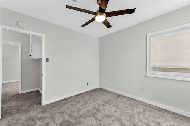 14403 S White Ave, Compton, CA 90221 - carpeted spare room with ceiling fan, baseboards, and a smoke detector