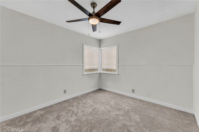 14403 S White Ave, Compton, CA 90221 - carpeted empty room featuring ceiling fan and baseboards