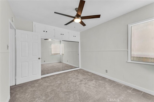 14403 S White Ave, Compton, CA 90221 - unfurnished bedroom with carpet, baseboards, a closet, and ceiling fan