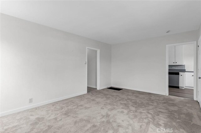 14403 S White Ave, Compton, CA 90221 - unfurnished room with carpet flooring and baseboards