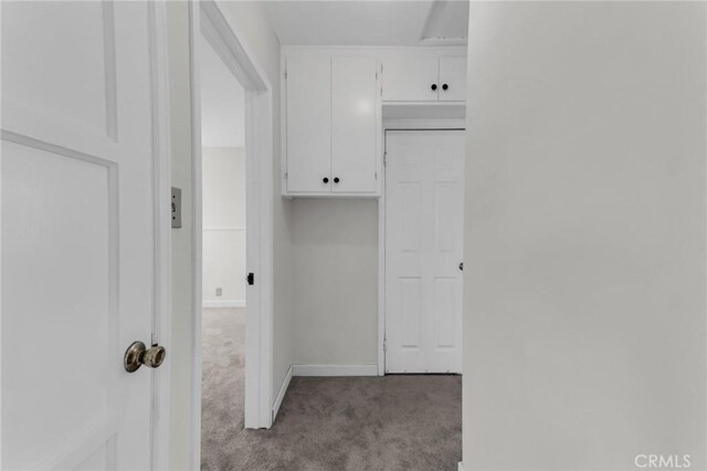 14403 S White Ave, Compton, CA 90221 - laundry room featuring carpet flooring and baseboards