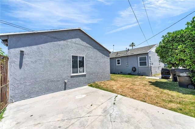 14403 S White Ave, Compton, CA 90221 - rear view of house featuring stucco siding and a patio area
