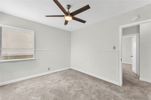 14403 S White Ave, Compton, CA 90221 - spare room featuring ceiling fan, carpet flooring, and baseboards