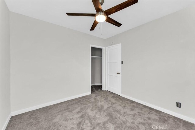 14403 S White Ave, Compton, CA 90221 - unfurnished bedroom featuring carpet flooring, a closet, and baseboards