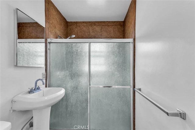 14403 S White Ave, Compton, CA 90221 - full bathroom with a shower with door and toilet