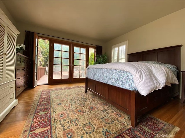 405 Waterview, Playa Del Rey, CA 90293 - bedroom featuring access to exterior, french doors, and wood finished floors