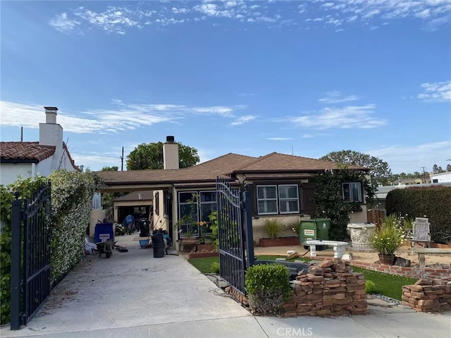 405 Waterview, Playa Del Rey, CA 90293 - view of front of home with a chimney and stucco siding